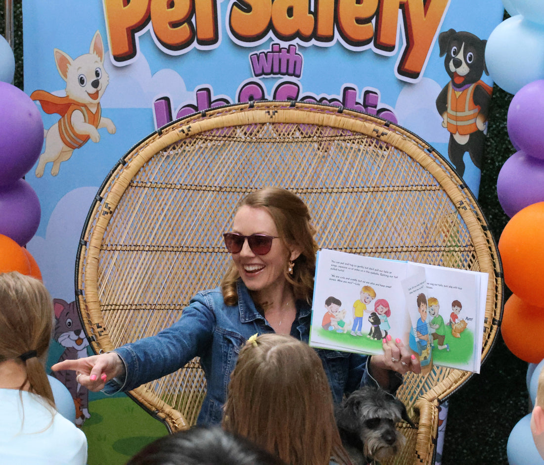 Christine Devane reading Pet Safety with Lola and Sophie at the Pages and Paws book launch event